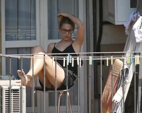 Candid Blonde Babe Showing her Feet on the Balcony