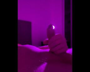 Hot white man masturbating in bed with neon light 2