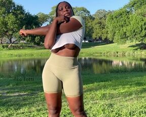 Naughty Black Girl Stretching and Flashing in a Public Park