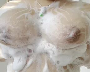 teen plays with big soapy titties while showering