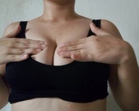 Bad girl massages her tits after exercising