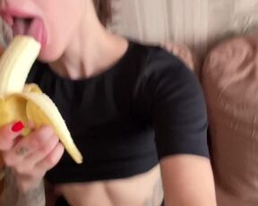 Sexy college girl sucking on a banana