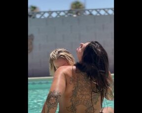 Sexy lesbian makeout with back tattoo visible