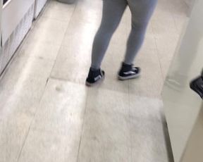 Latina in gray leggings