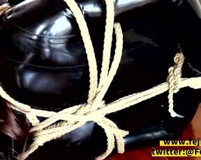 Fejira com Bondage and gagging on latex bodysuit