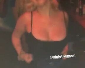 Violet Benson dancing in club in a sexy black dress