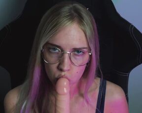 Beautiful Bitch in Glasses Sucking Dildo