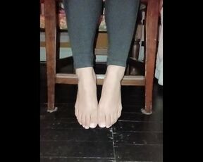 Pretty woman shows off her pretty feet